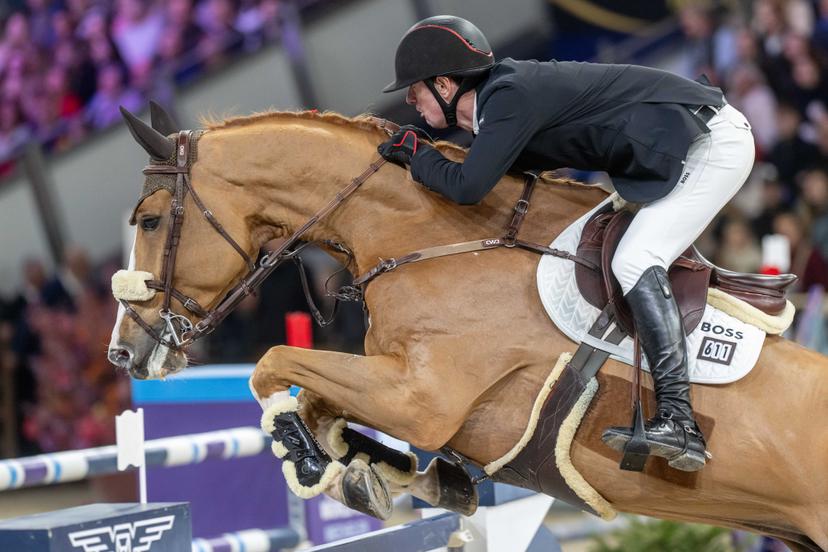 Rider Jos Verlooy and horse Renshaw van't Meulenhof are pictured during the FEI World Cup Jumping competition at the "Vlaanderens Kerstjumping" equestrian event in Mechelen on Tuesday 30 December 2025. BELGA PHOTO JONAS ROOSENS
