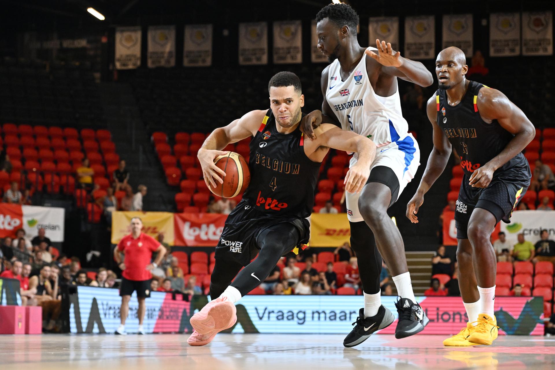 Belgium's Emmanuel Manu Lecomte and Great Britain's Amin Adamu fight for the ball during a basketball match between Belgium's national team Belgian Lions and Great Britain, Friday 15 August 2025 in Oostende, in a friendly tournament. BELGA PHOTO MAARTEN STRAETEMANS