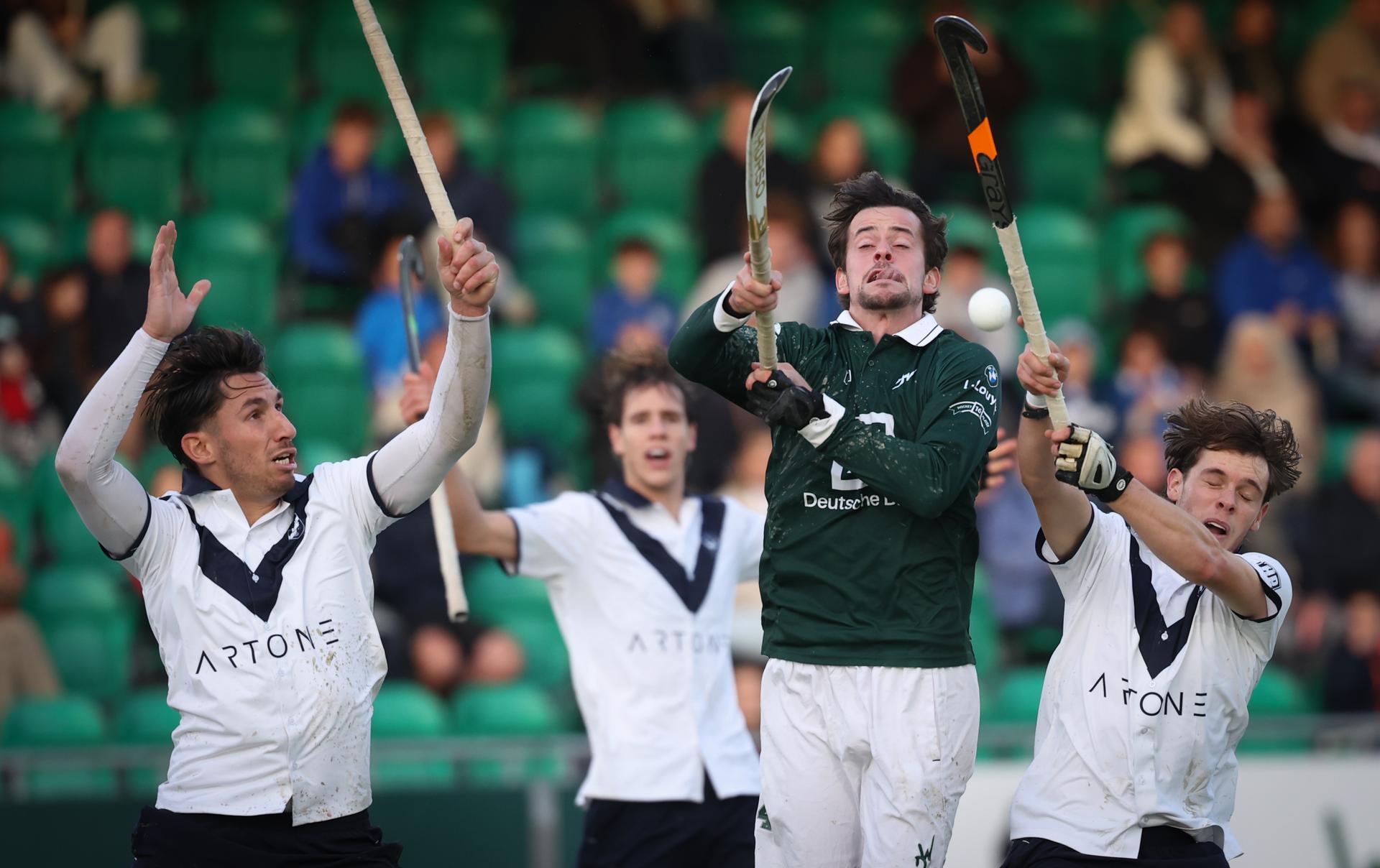 WatDucks' Tommy Willems and Uccle's Thomas Joye fight for the ball during a hockey game between Waterloo Ducks and Uccle Sport, Tuesday 11 November 2025 in Waterloo, on day 11 of the Belgian Men Hockey League season 2025-2026. BELGA PHOTO VIRGINIE LEFOUR