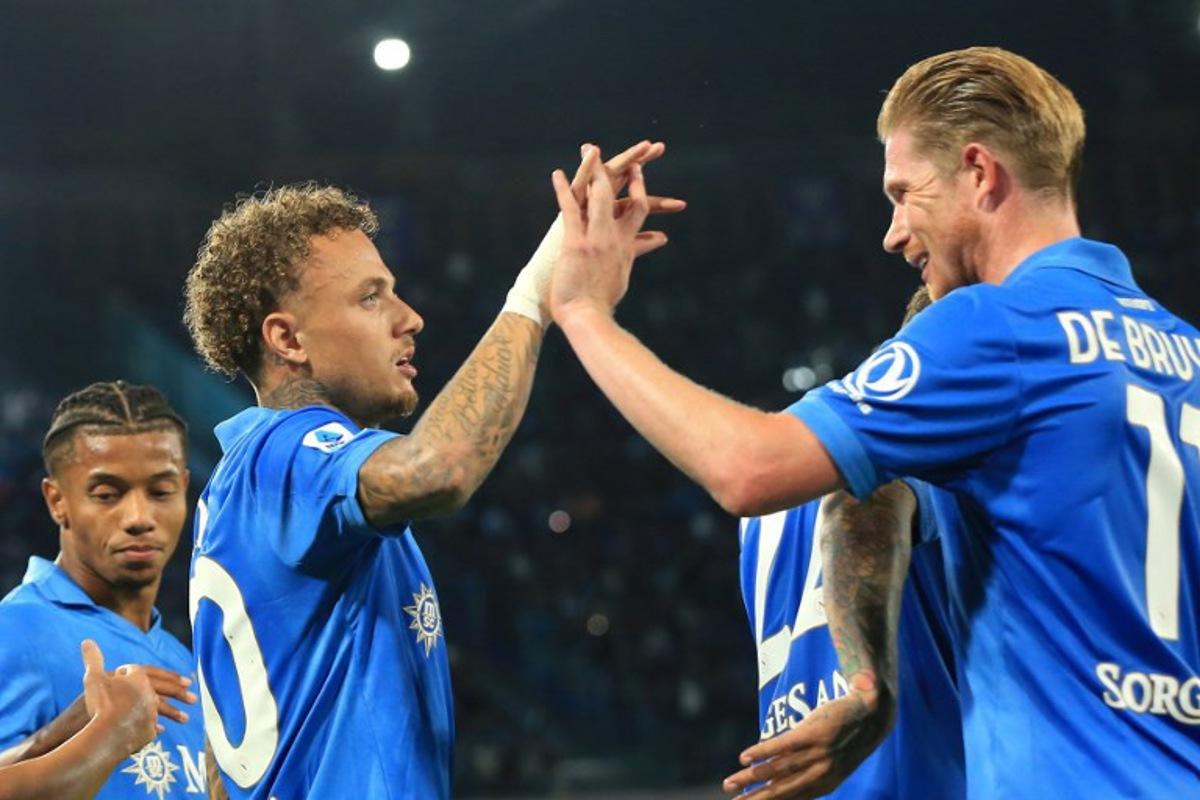 Napoli's Dutch forward #70 Noa Lang (L) celebrates with Napoli's Belgian midfielder #11 Kevin De Bruyne (R) after scoring a goal during the Italian Serie A football match between Napoli and Frosinone Calcio at the Diego Armando Maradona Stadium in Naples, on October 10, 2026.  CARLO HERMANN / AFP