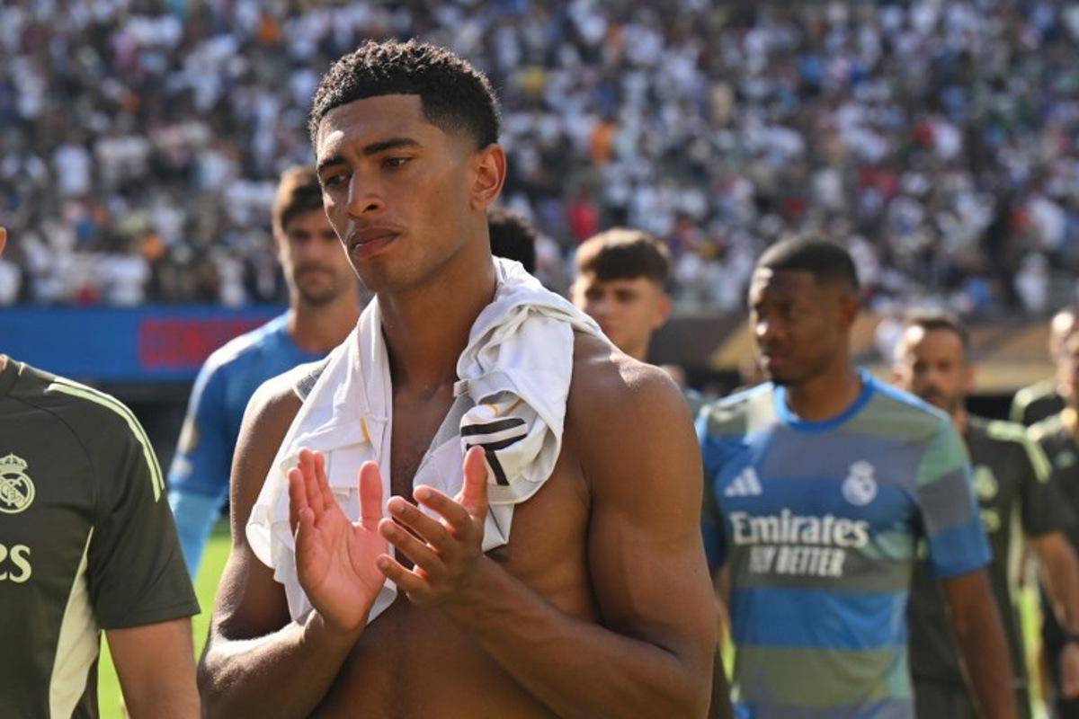 Real Madrid's English midfielder #05 Jude Bellingham reacts at the end of the FIFA Club World Cup 2025 semifinal football match between France's Paris Saint-Germain and Spain's Real Madrid at the MetLife stadium in East Rutherford, New Jersey on July 9, 2025.  ANGELA WEISS / AFP