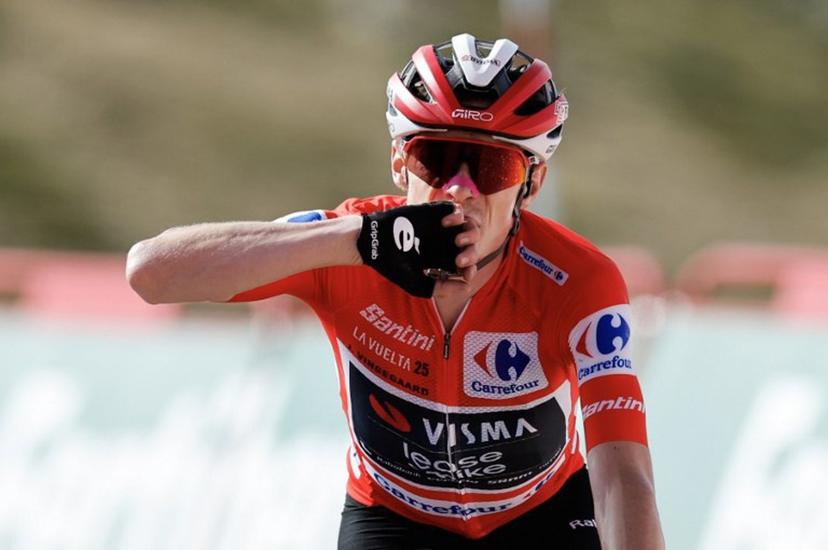 (FILES) Overall leader team Visma-Lease a bike's Danish rider Jonas Vingegaard celebrates winning the 20th stage of the Vuelta a Espana 2025, a 156 km race between Robledo de Chavela and Bola del Mundo, near Navacerrada, on September 13, 2025.   The final stage of the Vuelta a Espana was abandoned on September 14, 2025 because of huge pro-Palestinian protests in Madrid, with Jonas Vingegaard crowned champion for the first time. The race's overall leader crossed first the finish line on the Bola del Mundo mountain the day before, which effectively sealed his victory in the Vuelta a Espana 2025. Oscar DEL POZO / AFP