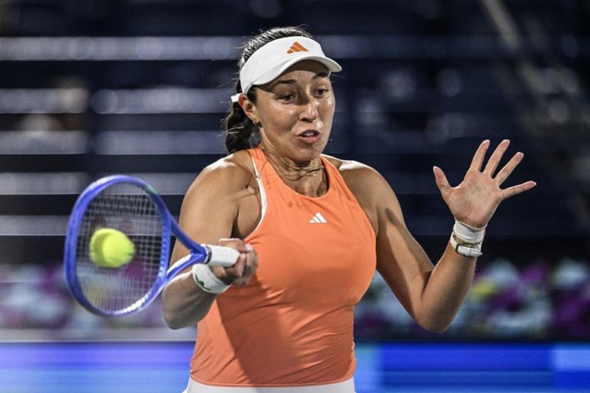 US player Jessica Pegula hits a return to Ukraine's Elina Svitolina during their women's singles final match at the Dubai Duty Free Tennis tournament in Dubai on February 21, 2026.  Ryan Lim / AFP