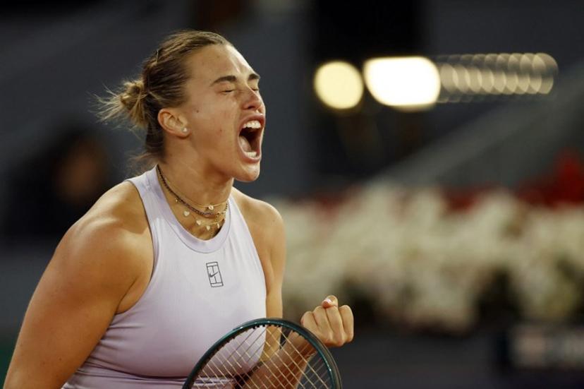 Belarus' Aryna Sabalenka reacts to wining a point against Ukraine's Marta Kostyuk during their 2025 WTA Tour Madrid Open tennis tournament singles match at the Caja Magica in Madrid, on April 30, 2025.  OSCAR DEL POZO / AFP