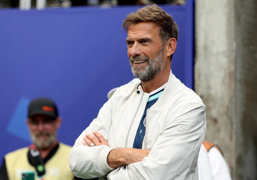 (FILES) German coach Jurgen Klopp attends the FIFA World Cup 2026 Group E match between Germany and Curacao at Houston Stadium on June 14, 2026 in Houston, Texas. Jurgen Klopp insisted on July 4, 2026 he was recharged and "ready" for what he said would be "intensive discussions" over becoming the new coach of Germany. Klopp told the German FA (DFB) on July 3 that he was "fundamentally willing" to take over as Germany's coach after Julian Nagelsmann resigned.  ALEXANDER HASSENSTEIN / GETTY IMAGES NORTH AMERICA / AFP