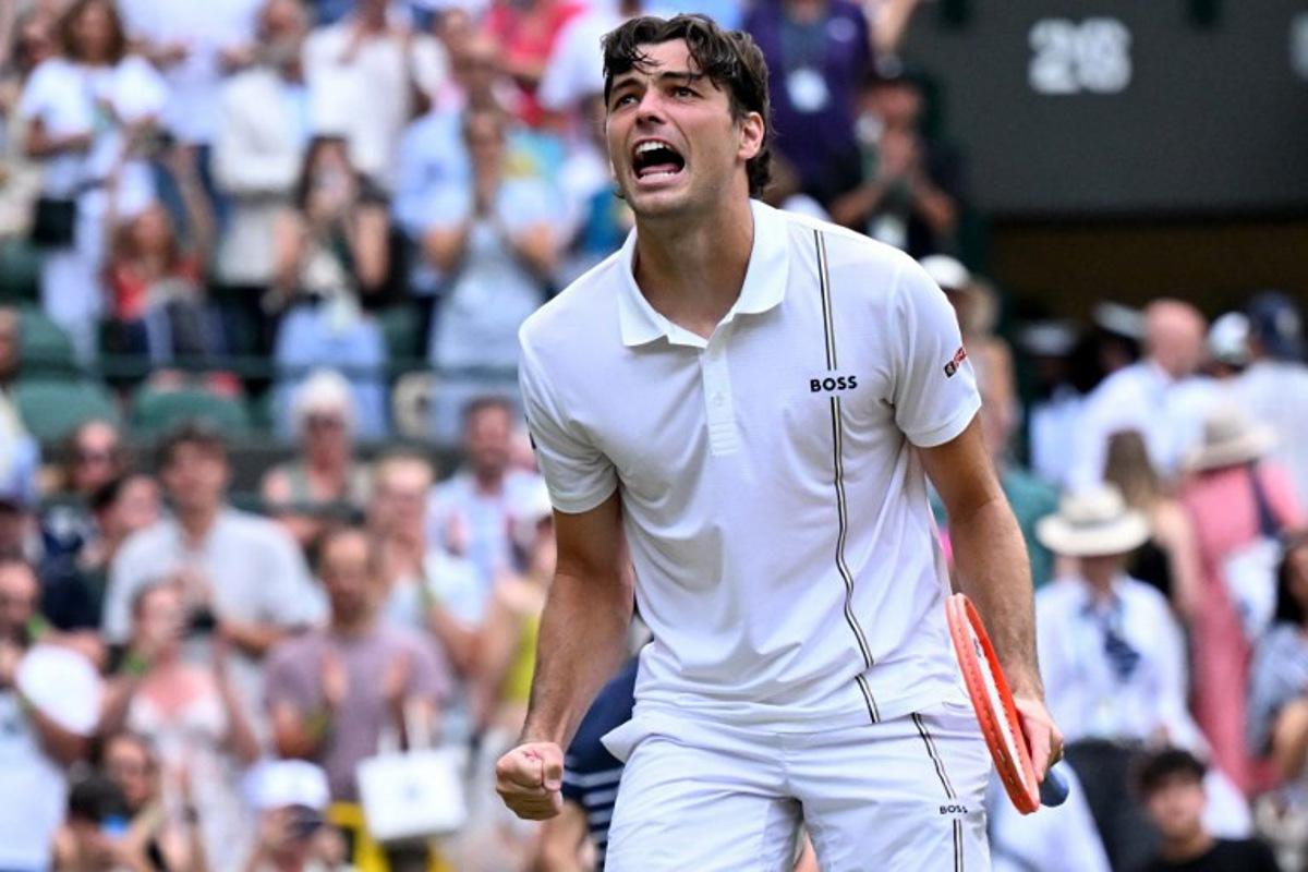 US player Taylor Fritz celebrates winning against Kazakhstan's Alexander Bublik during their men's singles round of 16 tennis match on the eighth day of the 2026 Wimbledon Championships at The All England Lawn Tennis and Croquet Club in Wimbledon, southwest London, on July 6, 2026.  Kirill KUDRYAVTSEV / AFP