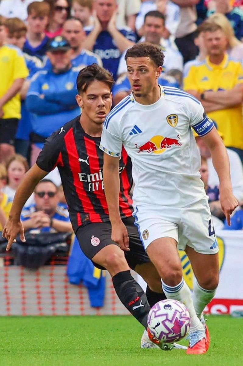 Leeds United's Welsh midfielder #04 Ethan Ampadu looks to play a pass during the pre-season friendly football match between Leeds United and AC Milan at the Aviva Stadium in Dublin on August 9, 2025.   Paul Faith / AFP