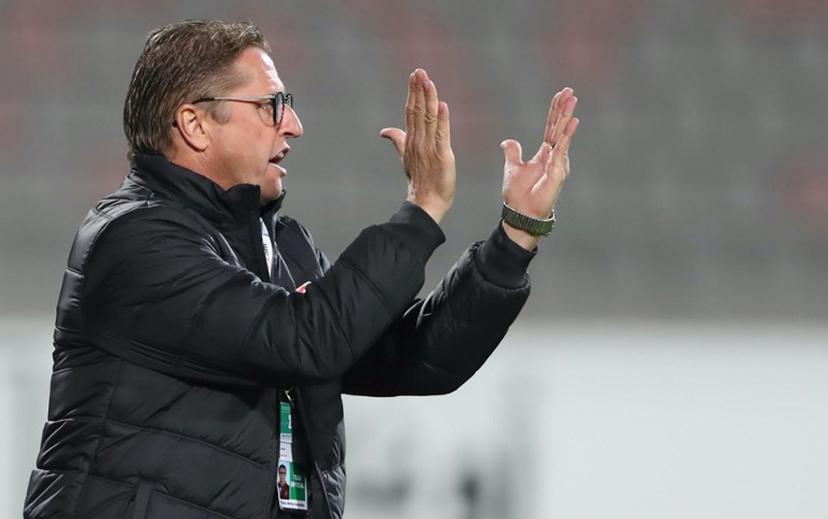Jordan's coach Vital Borkelmans speaks to his players during the FIFA World Cup 2022 and the 2023 AFC Asian Cup qualifying football match between Jordan and Chinese Taipei Amman International Stadium in the Jordanian capital on November 19, 2019.  Ahmad ALAMEEN / AFP
