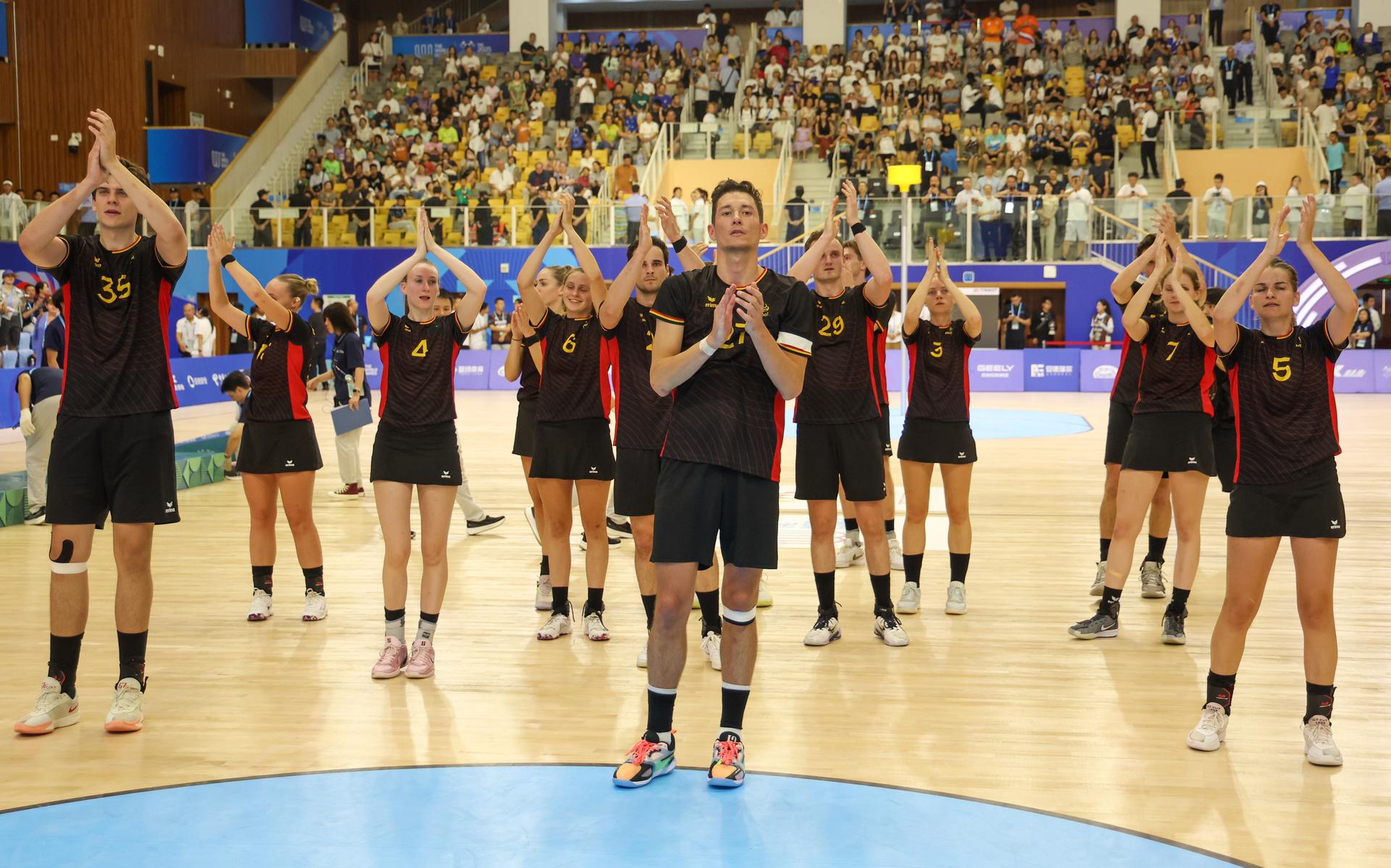belgian team players pictured after  a game against the Netherlands in the final of the Korfball competition of the World Games 2025, in Chenghdu, China, on Tuesday 12 August 2025. This year, the World Games take place from 07 to 17 augustus. BELGA PHOTO VIRGINIE LEFOUR