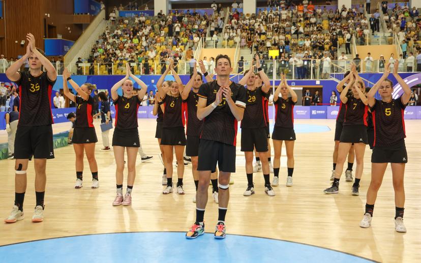 belgian team players pictured after  a game against the Netherlands in the final of the Korfball competition of the World Games 2025, in Chenghdu, China, on Tuesday 12 August 2025. This year, the World Games take place from 07 to 17 augustus. BELGA PHOTO VIRGINIE LEFOUR