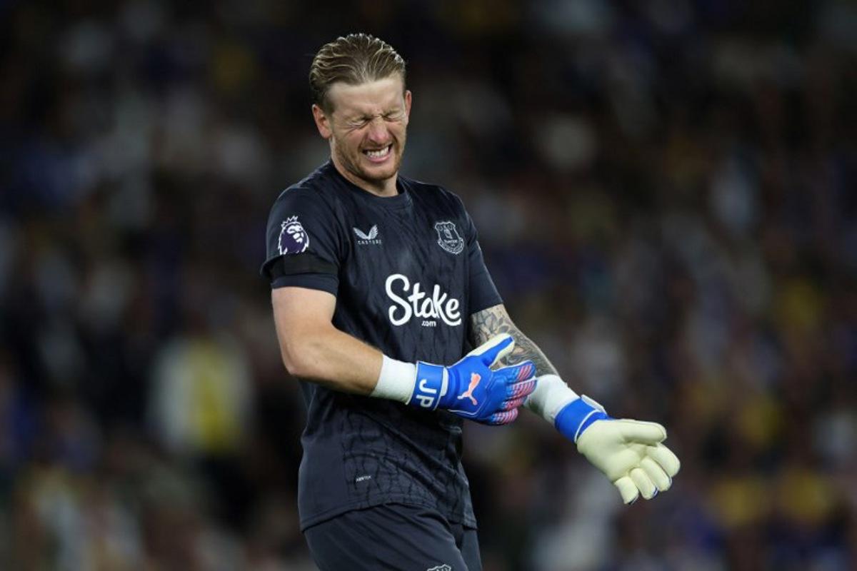 Everton's English goalkeeper #01 Jordan Pickford reacts during the English Premier League football match between Leeds United and Everton at Elland Road in Leeds, northern England on August 18, 2025.  Darren Staples / AFP