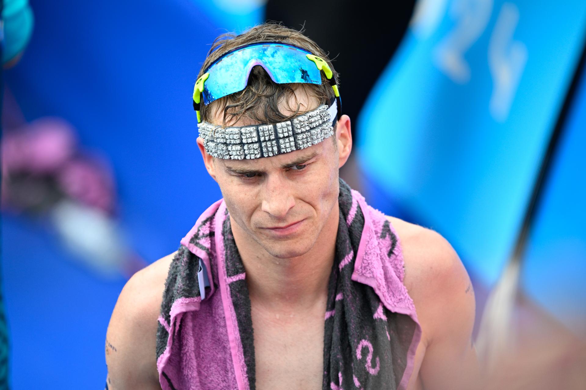 Belgian Marten Van Riel reacts after the men's individual triathlon race at the Paris 2024 Olympic Games, on Wednesday 31 July 2024 in Paris, France. The Games of the XXXIII Olympiad are taking place in Paris from 26 July to 11 August. The Belgian delegation counts 165 athletes competing in 21 sports. BELGA PHOTO JASPER JACOBS