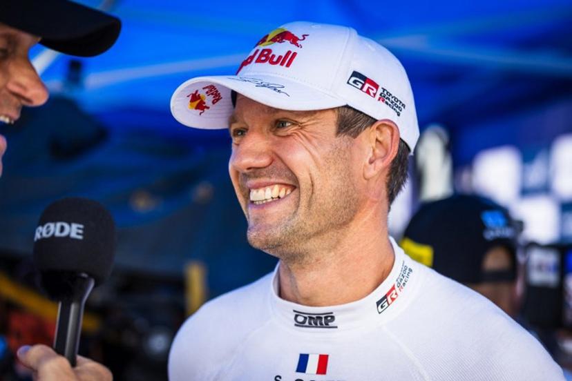 French driver Sebastien Ogier (R) gives an interview during the regroup section at the WRC Rally Finland in Jyvaskyla, Finland on August 2, 2025.  Valtteri Vainio / Lehtikuva / AFP
