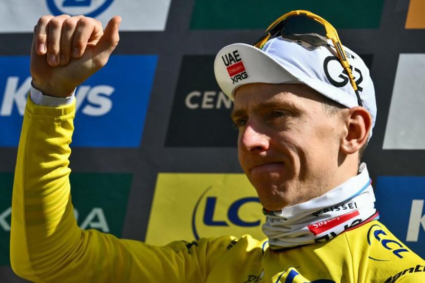 UAE Team Emirates - XRG team's Slovenian rider Tadej Pogacar celebrates on the podium with the overall leader's yellow jersey after the 16th stage of the 112th edition of the Tour de France cycling race, 171.5 km between Montpellier and Mont Ventoux, southern France, on July 22, 2025.  Marco BERTORELLO / AFP