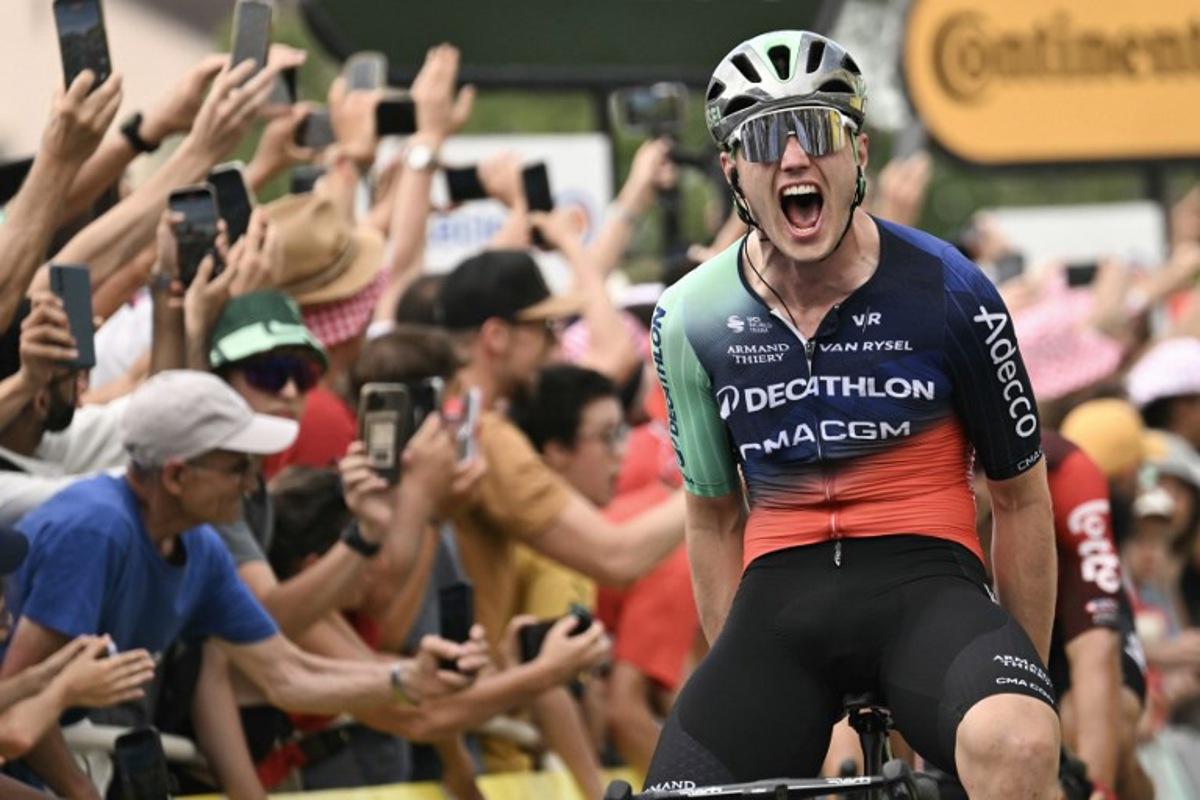 Decathlon CMA CGM Team's Dutch rider Olav Kooij cycles to the finish line to win the 5th stage of the 113th edition of the Tour de France cycling race, 158 km between Lannemezan and Pau in southwestern France, on July 8, 2026.  Jeff PACHOUD / AFP
