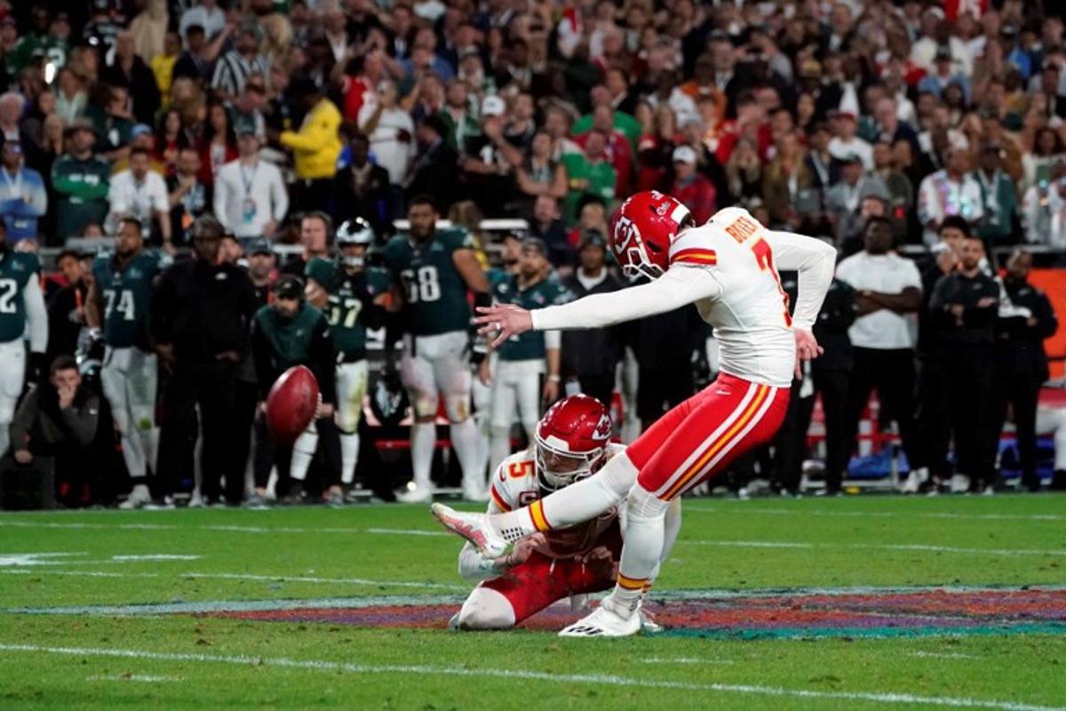 Kansas City Chiefs' kicker Harrison Butker scores the winning points during Super Bowl LVII between the Kansas City Chiefs and the Philadelphia Eagles at State Farm Stadium in Glendale, Arizona, on February 12, 2023.   TIMOTHY A. CLARY / AFP