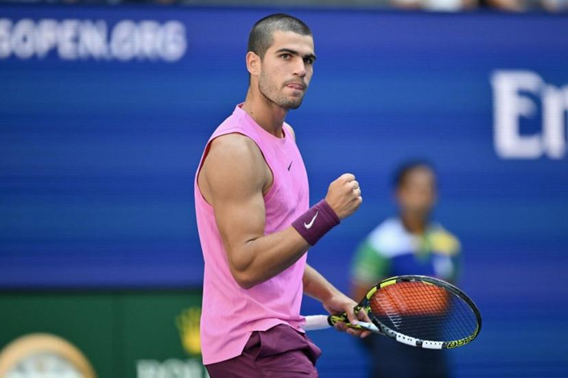 Spain's Carlos Alcaraz celebrates a point during his men's singles round of 16 tennis match against France's Arthur Rinderknech on day eight of the US Open tennis tournament at the USTA Billie Jean King National Tennis Center in New York City, on August 31, 2025.  ANGELA WEISS / AFP
