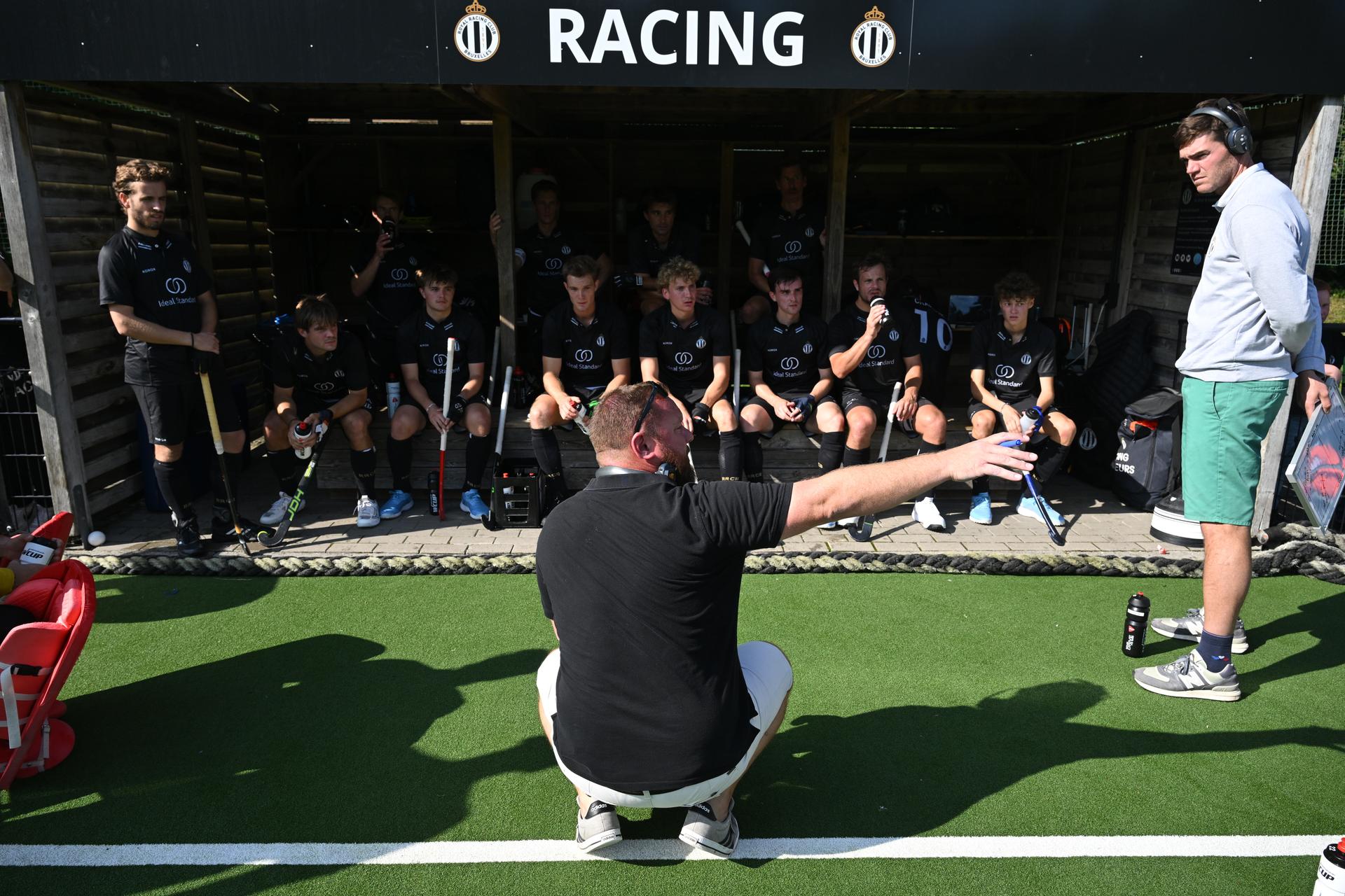 Racing's head coach Xavier De Greve talks during a hockey game between Racing and Waterloo Ducks, Sunday 15 September 2024 in Gent, on the second day of the Belgian first division hockey championship. BELGA PHOTO JOHN THYS