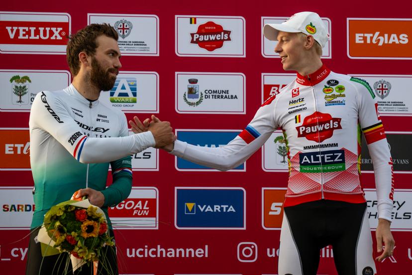 Dutch Joris Nieuwenhuis and Belgian Michael Vanthourenhout pictured on the podium after the men's elite race of the Cyclocross World Cup, in Terralba, Sardinia, Italy, Sunday 07 December 2025, stage 3 (out of 12) in the World Cup of the 2026-2027 season. BELGA PHOTO DAVID PINTENS