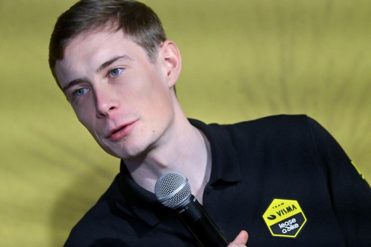 Visma-Lease a bike's Danish rider Jonas Vingegaard speaks at a press conference during the presentation of the Visma-Lease a Bike cycling team at La Nucia near Alicante, eastern Spain on January 13, 2026.  Jose Jordan / AFP