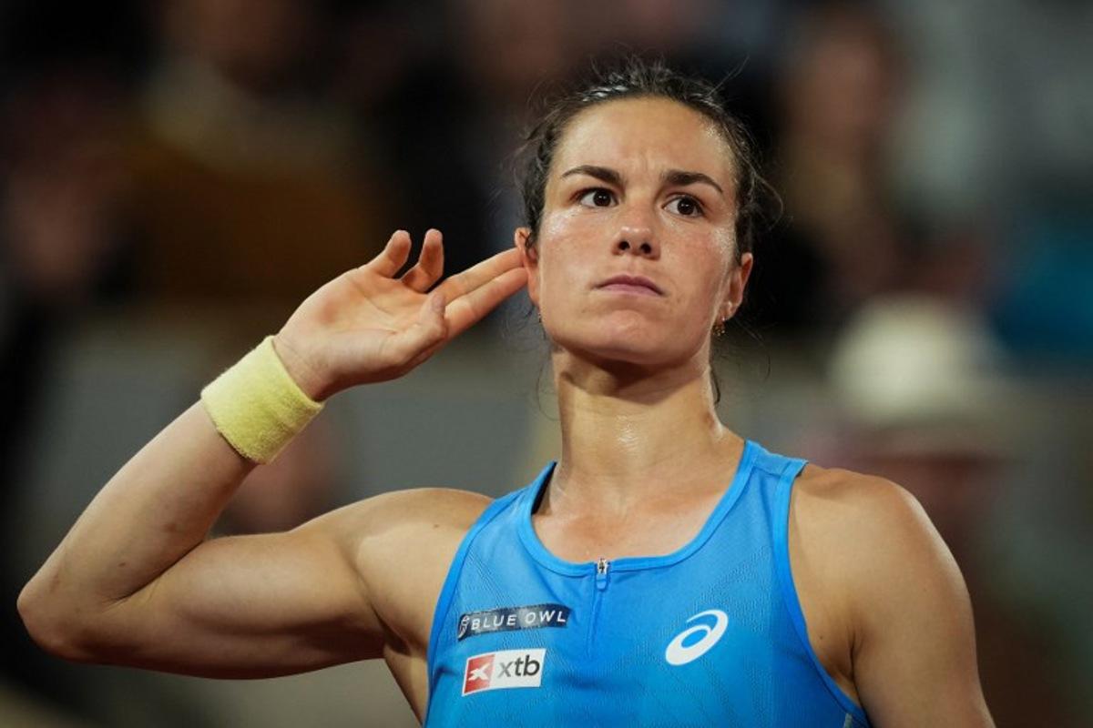 France's Lois Boisson reacts after winning a set during her women's singles quarter-final match against Russia's Mirra Andreeva on day 11 of the French Open tennis tournament on Court Philippe-Chatrier at the Roland-Garros Complex in Paris on June 4, 2025.  Dimitar DILKOFF / AFP