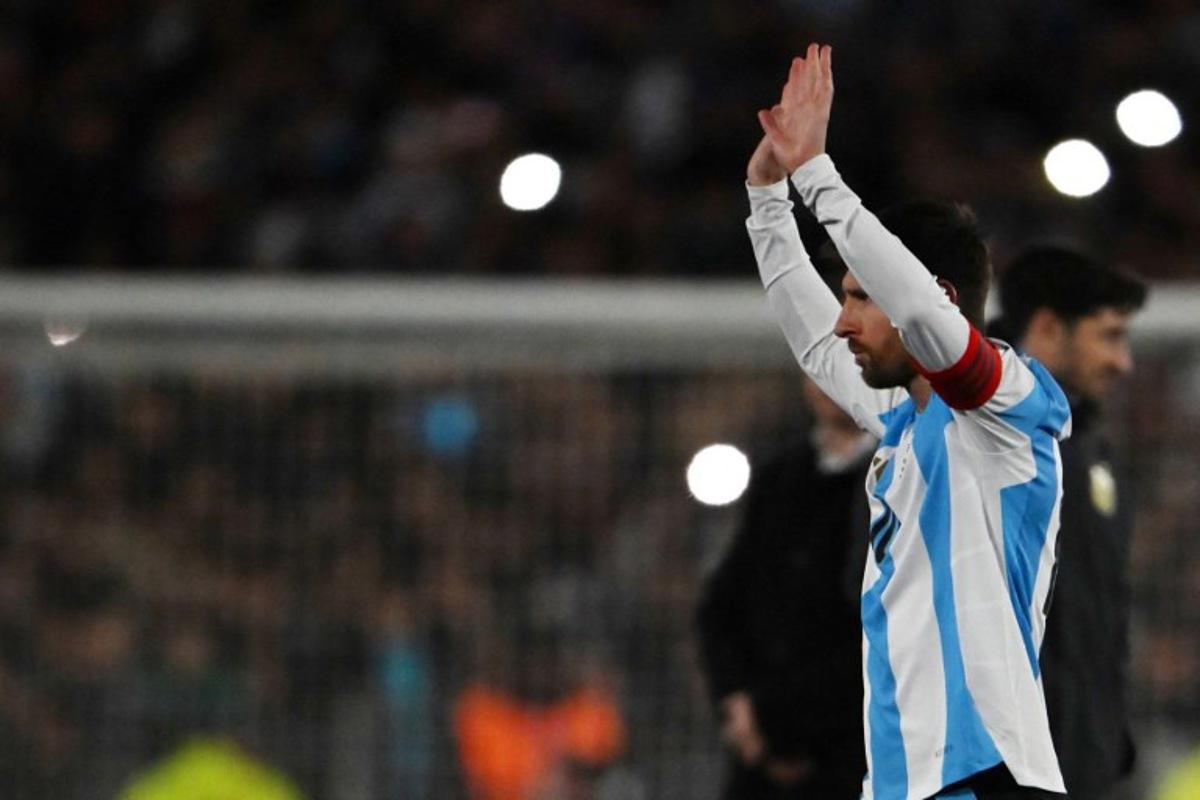Argentina's forward #10 Lionel Messi waves to the fans at the end of the 2026 FIFA World Cup South American qualifiers football match between Argentina and Venezuela at the Mas Monumental stadium in Buenos Aires on September 4, 2025.   Luis ROBAYO / AFP