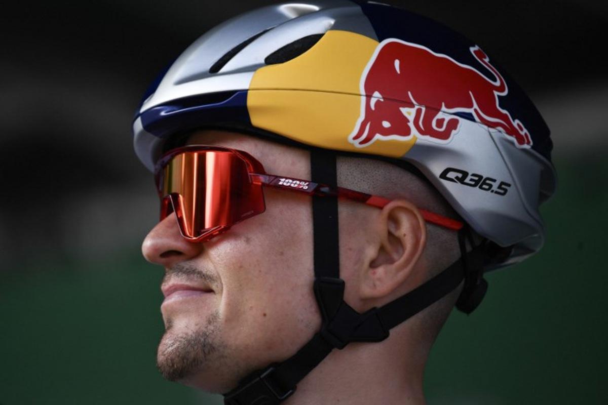 Q36.5 Pro Cycling Team's British rider Thomas Pidcock looks on, ahead of the 119th edition of the Giro di Lombardia (Tour of Lombardy), a 238km cycling race from Como to Bergamo on October 11, 2025.  Marco BERTORELLO / AFP