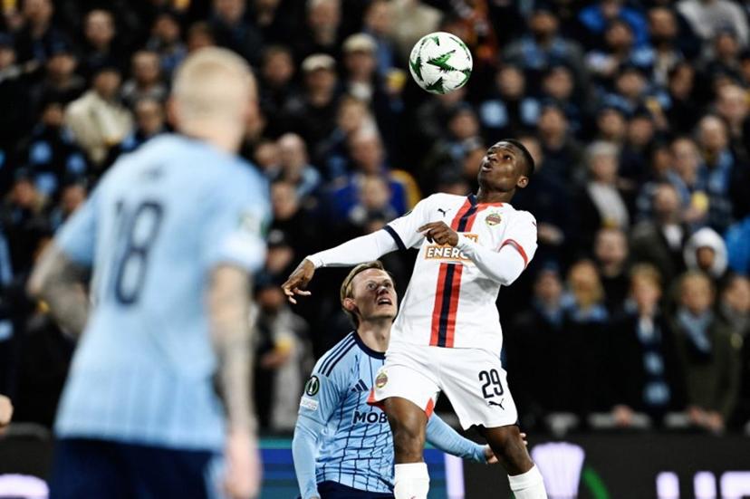 Djurgarden's Tobias Gulliksen and Rapid Vienna's Romeo Amane vie for the ball during the quarter-final Conference League football match 1 of 2, between Djurgården and SK Rapid Vienna in Stockholm on April 10, 2025.  Pontus LUNDAHL / TT NEWS AGENCY / AFP