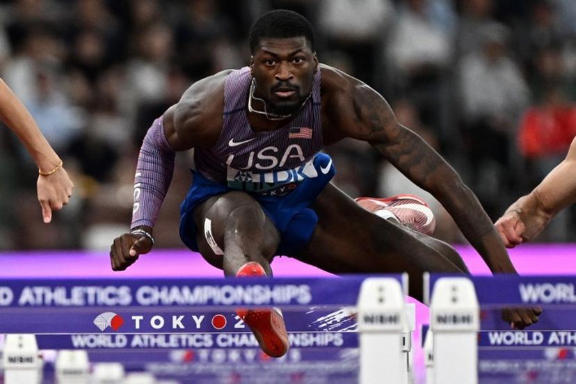 US' athlete Cordell Tinch competes in the men's 110m hurdles semi-final during the World Athletics Championships in Tokyo on September 16, 2025.  Jewel SAMAD / AFP