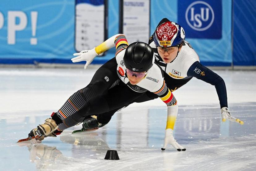Belgium's Hanne Desmet (L) and South Korea's Shim Suk Hee compete in the women's 500m (2) quarter-final at the ISU World Cup Short Track Speed Skating in Beijing on December 10, 2023.  Jade GAO / AFP