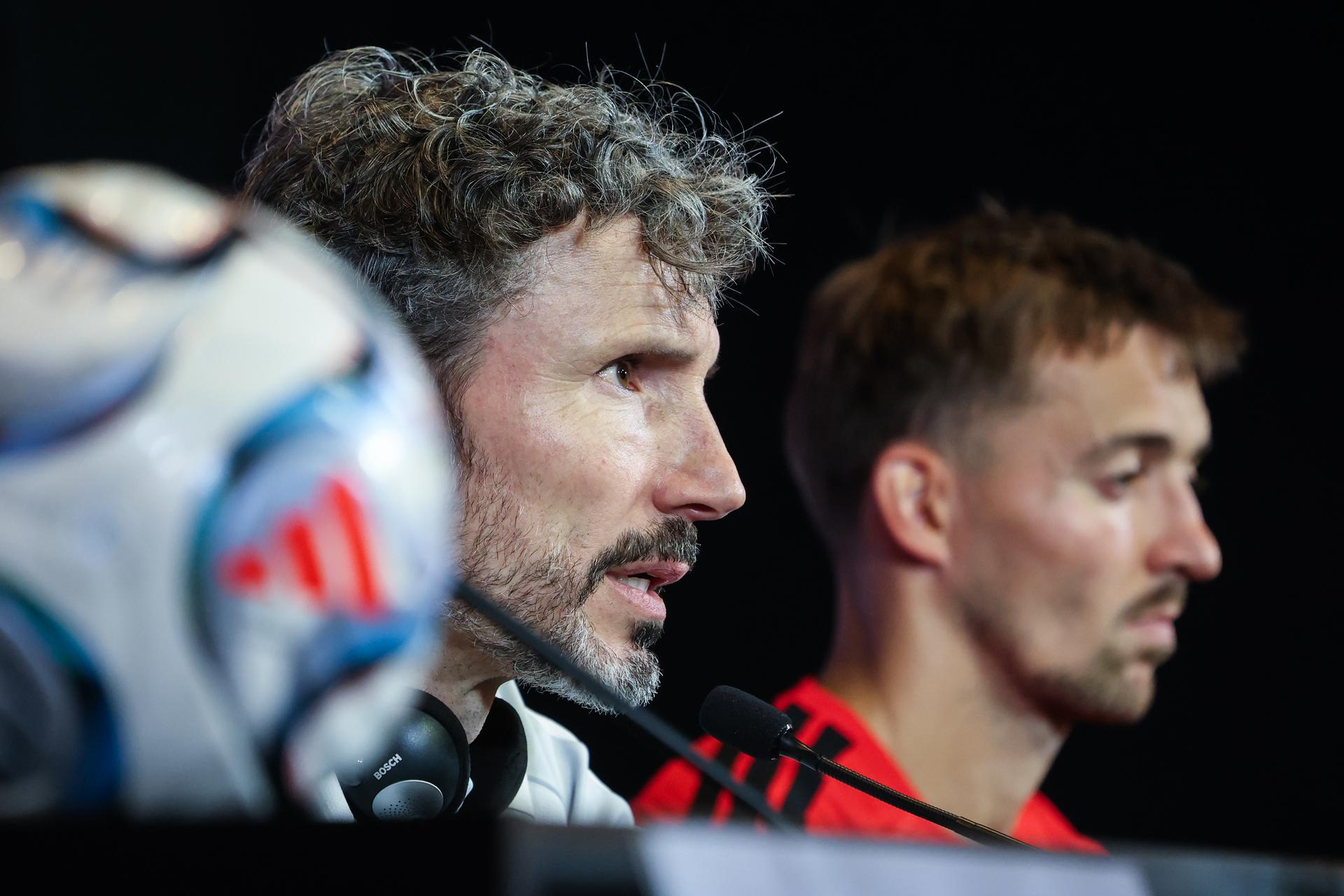 Belgium's head coach Mark van Bommel and Belgium's Timothy Castagne pictured during a press conference of the Red Devils, the Belgian national soccer team, on Sunday 27 September 2026 in Tubize. The team is preparing for the second game of the UEFA Nations League against France on Monday. BELGA PHOTO BRUNO FAHY