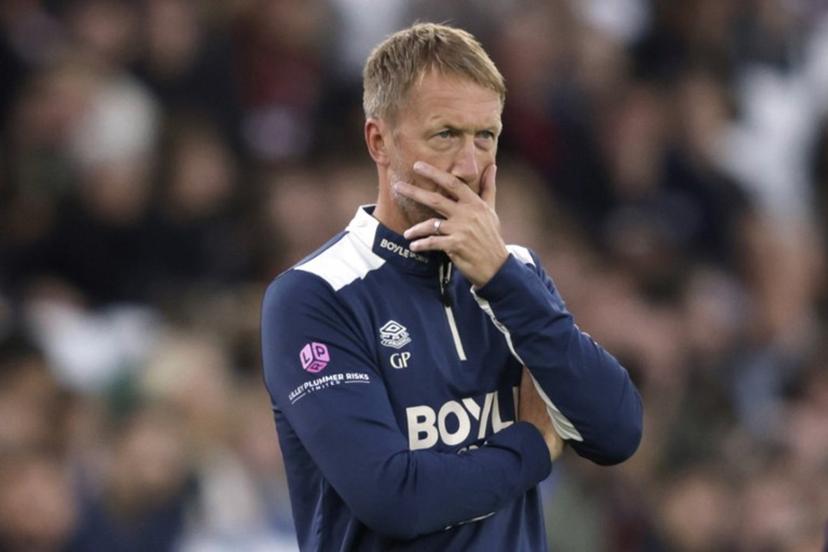 (FILES) West Ham United's English head coach Graham Potter looks on the touchline withe the score at 0-3 in the second half during the English Premier League football match between West Ham United and Tottenham Hotspur at the London Stadium, in London on September 13, 2025. Graham Potter has been dismissed by West Ham after only nine months, the club announced on its website, Saturday September 27. Ian Kington / AFP