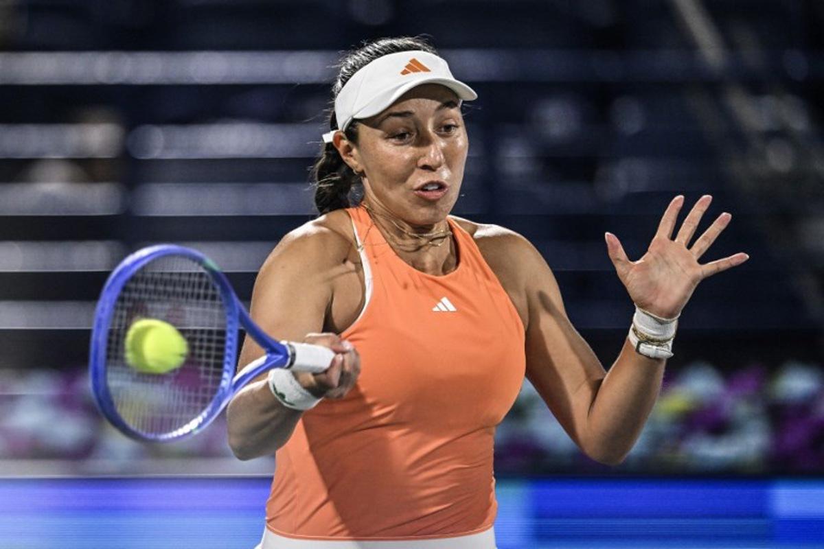 US player Jessica Pegula hits a return to Ukraine's Elina Svitolina during their women's singles final match at the Dubai Duty Free Tennis tournament in Dubai on February 21, 2026.  Ryan Lim / AFP
