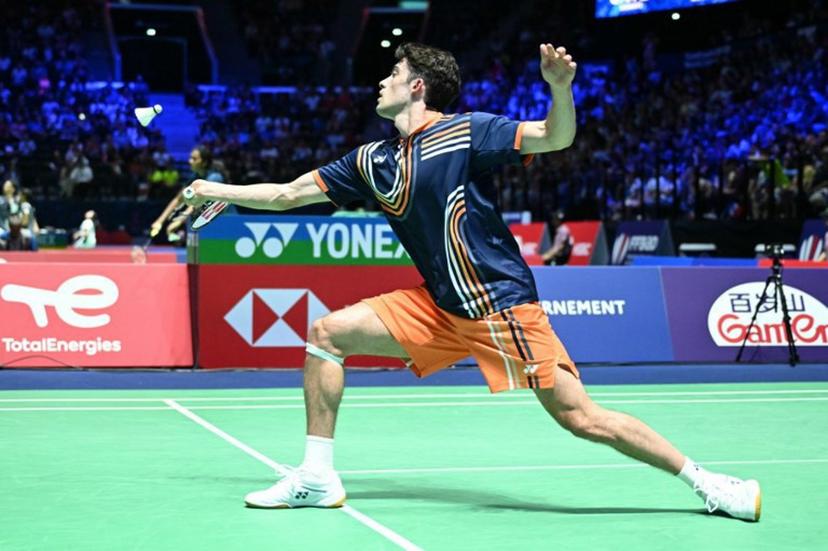 Belgium's Julien Carraggi hits a return to China's Yu Qi Shi during their men's single match at the Badminton BWF World Championships at the Adidas Arena in Paris, on August 27, 2025.  Bertrand GUAY / AFP