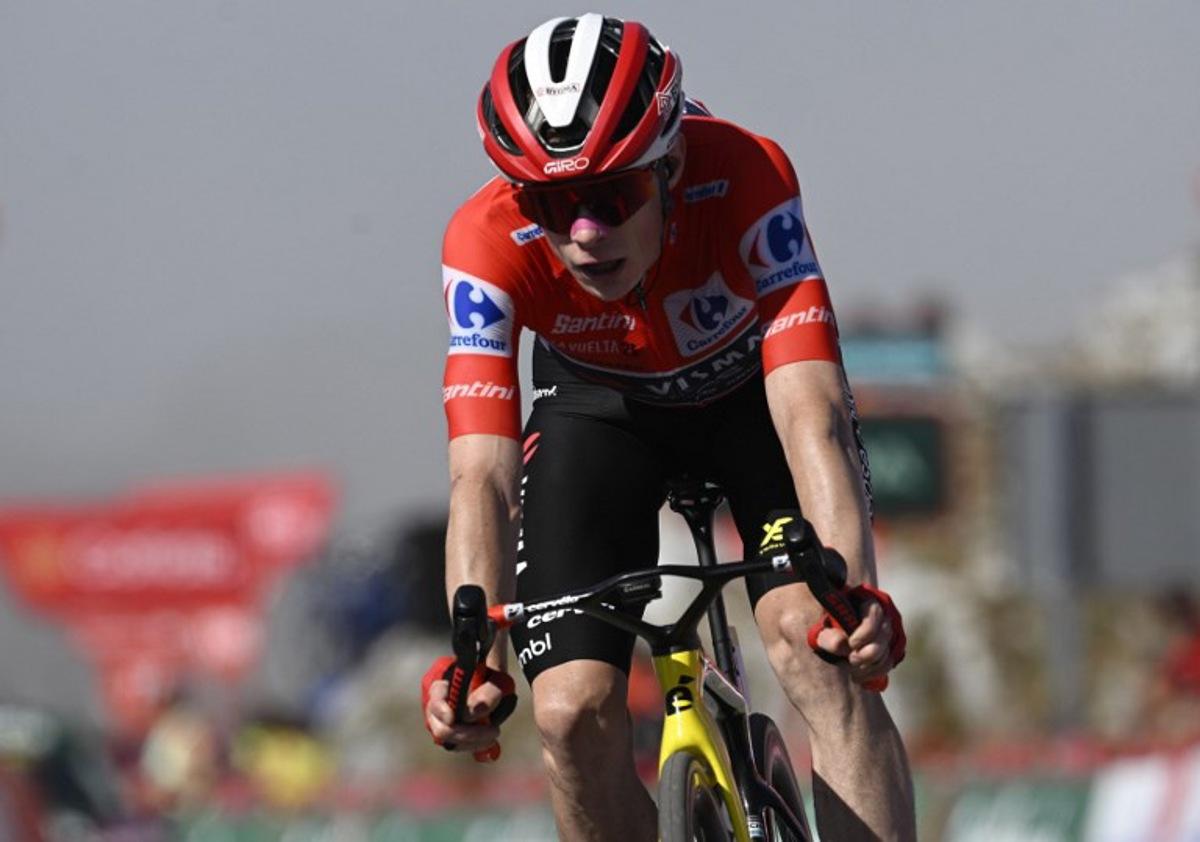 Second placed, overall leader of the Team Visma-Lease a Bike, Danish rider Jonas Vingegaard, crosses the finish line of the 13th stage of the Vuelta a Espana, a 202 km race between Cabezon de la Sal and L'Angliru, on September 5, 2025.    Miguel RIOPA / AFP