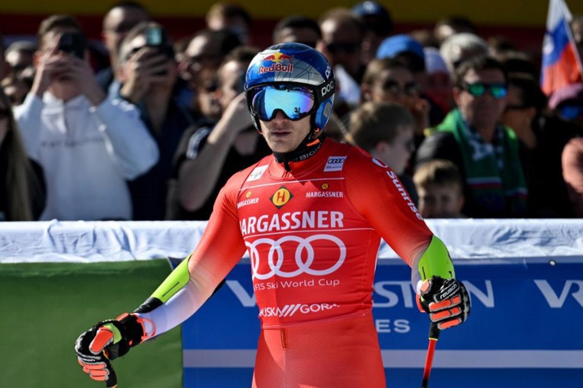Switzerland's Marco Odermatt reacts after crossing the finish line during the second run of the Men's Giant Slalom event, part of FIS Alpine Ski World Cup 2025-2026 in Kranjska Gora, Slovenia, on March 7, 2026. JURE MAKOVEC / AFP