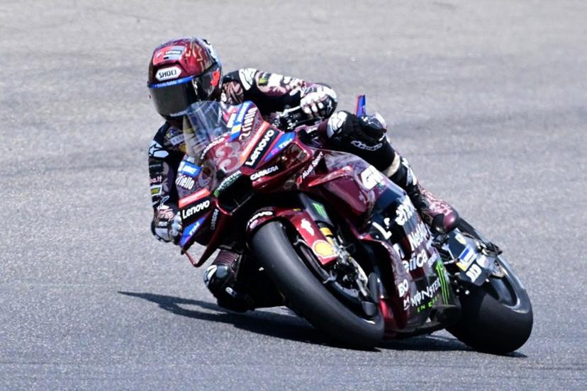 Ducati Lenovoi Team's Spanish MotoGP rider Marc Marquez steers his motorbike during the Italian Moto GP Grand Prix at Mugello circuit, in Mugello, near Florence, on June 22, 2025.   Tiziana FABI / AFP