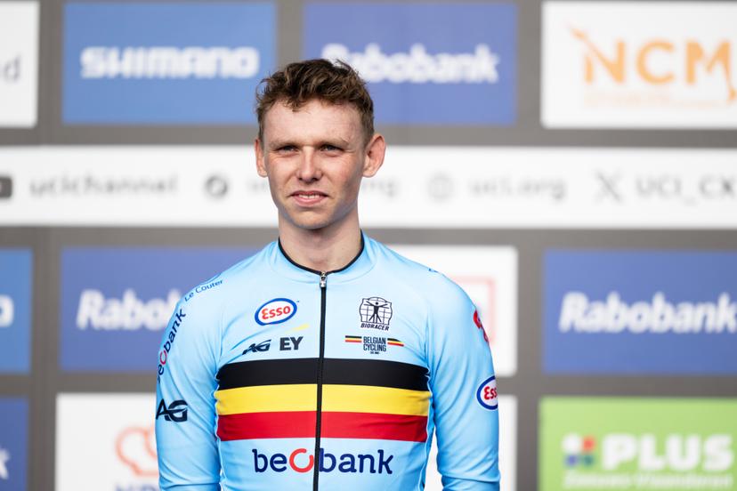 Belgian Aaron Dockx celebrates on the podium after winning the U23 men race at the UCI Cyclocross World Championships, on Saturday 31 January 2026, in Hulst, The Netherlands. BELGA PHOTO DAVID PINTENS