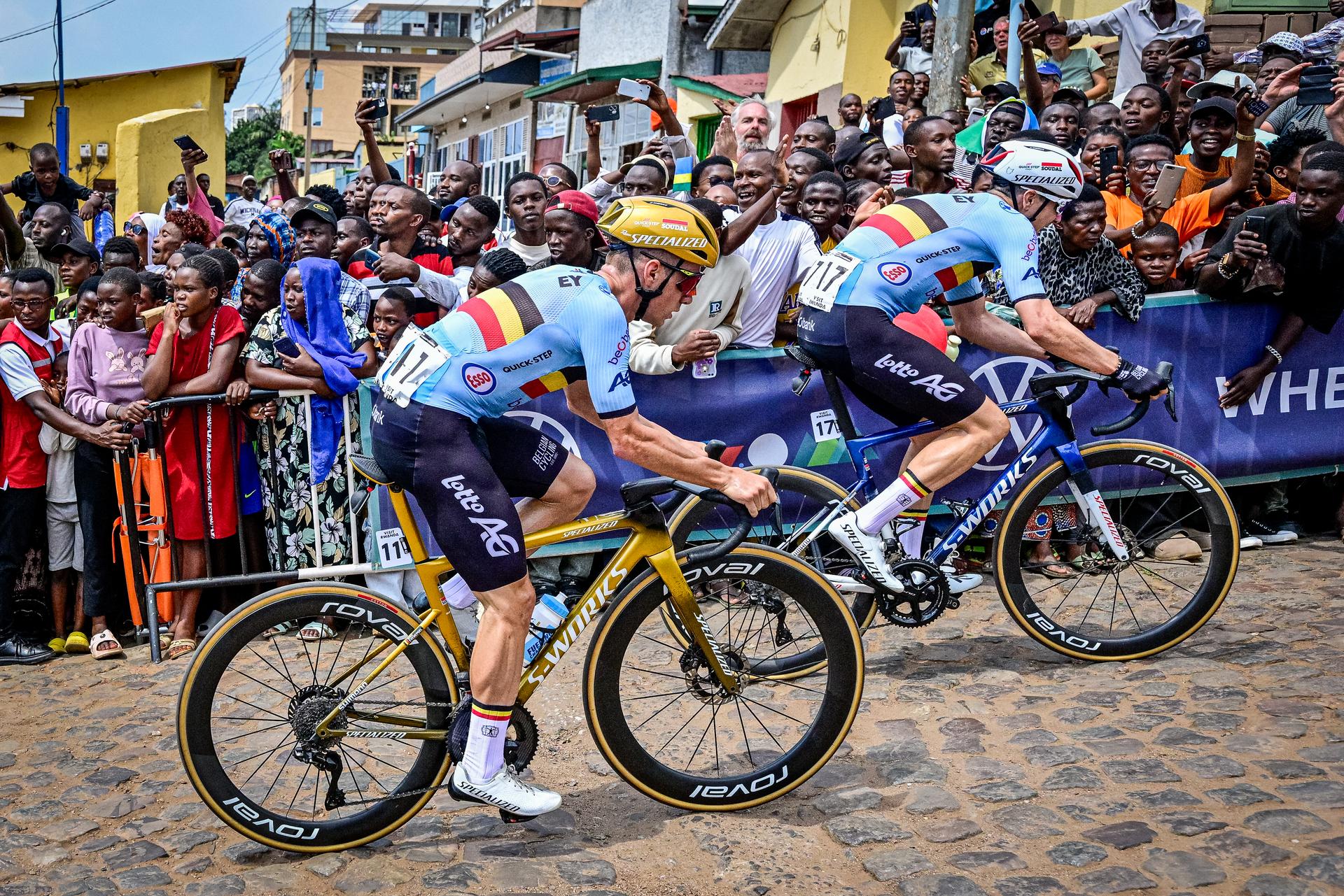 Belgian Remco Evenepoel and Belgian Louis Vervaeke pictured in action during the elite men road race (267,5 km) at the cycling road World Championships in Kigali, Rwanda, Sunday 28 September 2025. The 2025 UCI Road World Championships take place from 21 to 28 September in Kigali, Rwanda. BELGA PHOTO DIRK WAEM