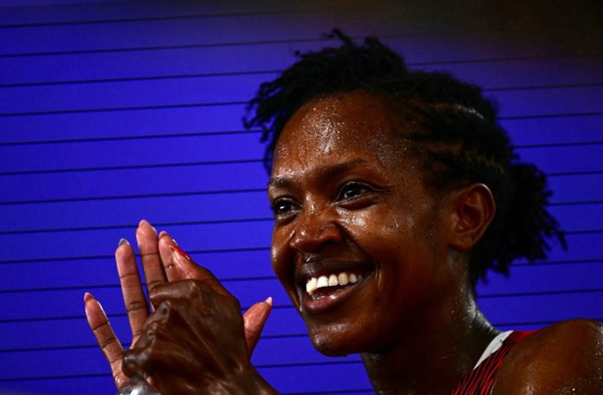 Kenya's Faith Kipyegon reacts after competing in the women's 1500m semi-final during the World Athletics Championships in Tokyo on September 14, 2025.  Yuichi YAMAZAKI / AFP