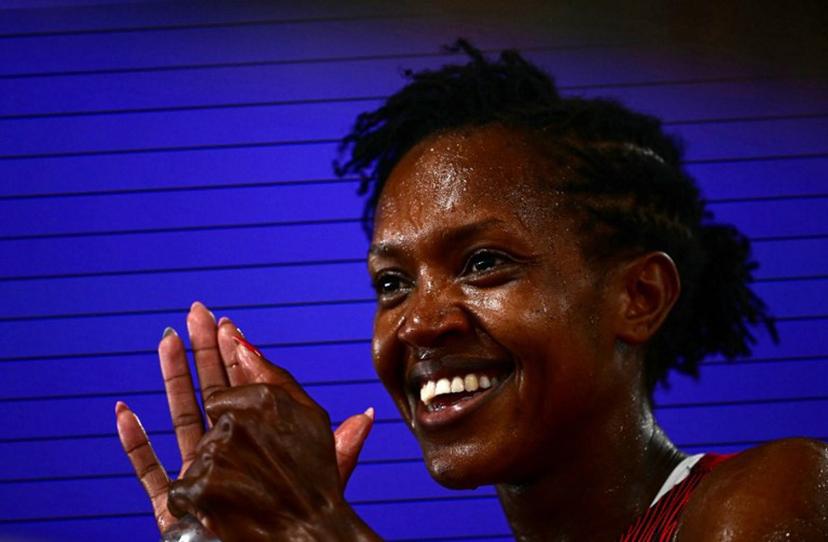 Kenya's Faith Kipyegon reacts after competing in the women's 1500m semi-final during the World Athletics Championships in Tokyo on September 14, 2025.  Yuichi YAMAZAKI / AFP