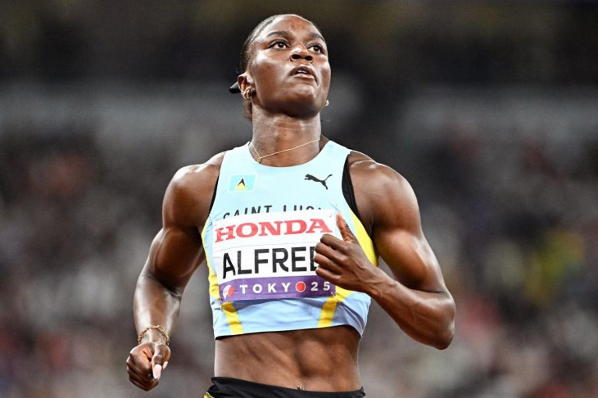 Saint Lucia's athlete Julien Alfred reacts in the women's 100m semi-final during the World Athletics Championships in Tokyo on September 14, 2025.  Jewel SAMAD / AFP