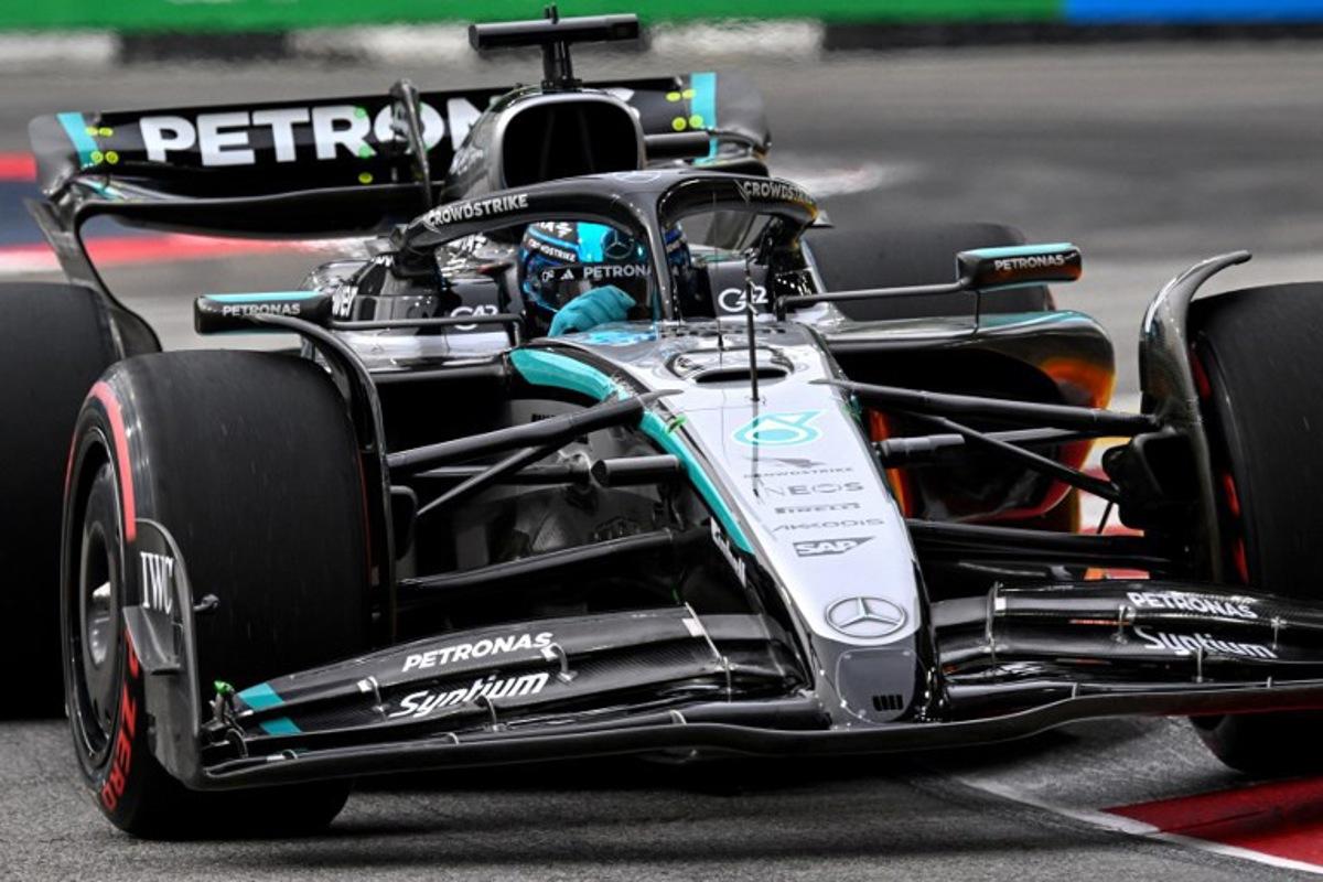 Mercedes' British driver George Russell drives during the third practice session ahead of the Formula One Singapore Grand Prix night race at the Marina Bay Street Circuit in Singapore on October 4, 2025.  ROSLAN RAHMAN / AFP