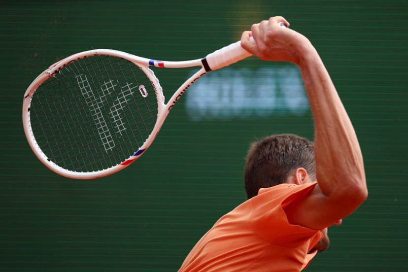 Russia's Daniil Medvedev smashes his racket on the clay as he plays against Italy's Matteo Berrettini during the Monte Carlo ATP Masters Series Tournament round of 32 tennis match on Court Rainier III at the Monte-Carlo Country Club in Roquebrune-Cap-Martin, south-eastern France on April 8, 2026.  Valery HACHE / AFP