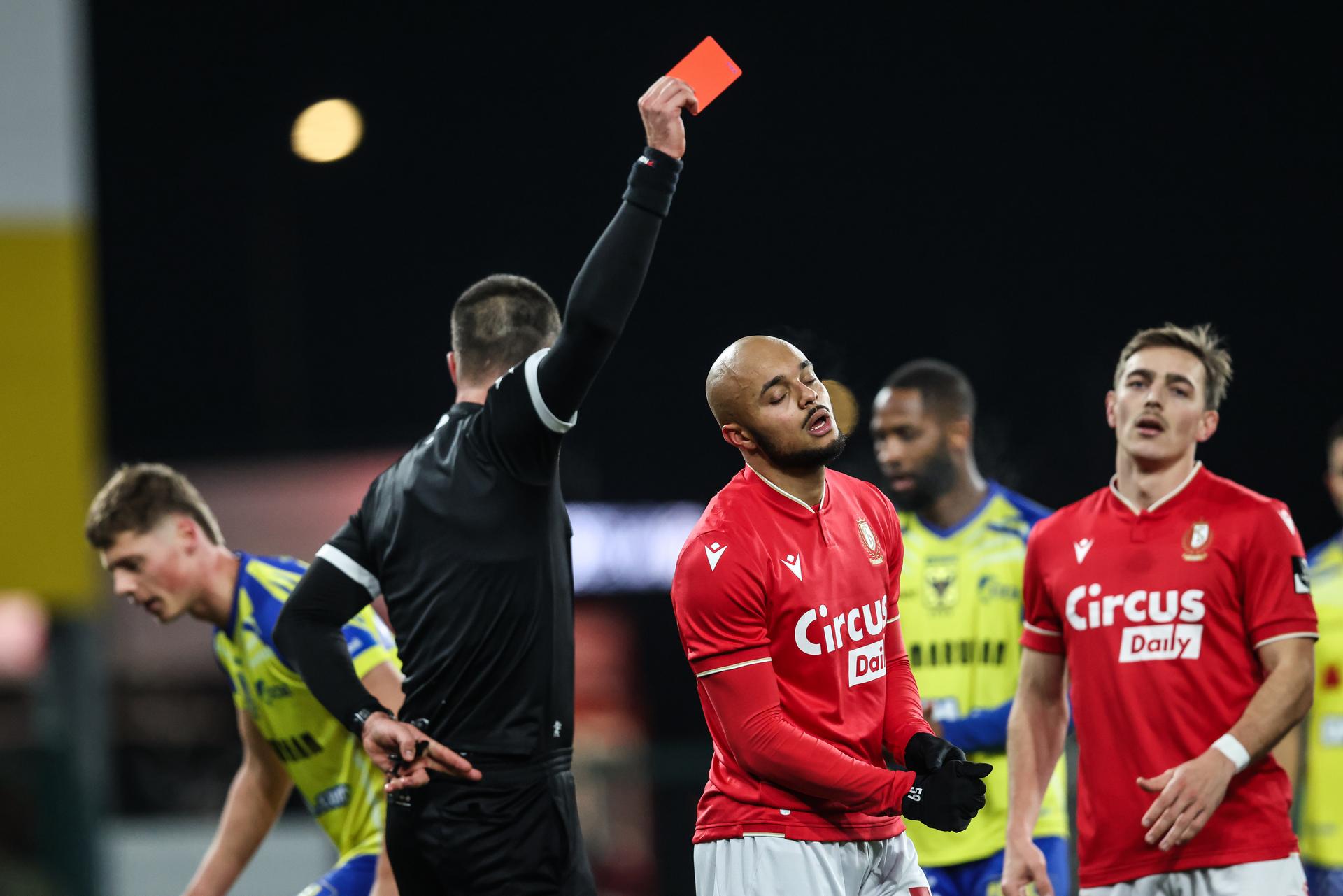 Standard's Timothe Nkada receives a red card from the referee during a soccer match between Standard de Liege and Sint-Truiden VV, Friday 26 December 2025 in Liege, on day 20 of the 2025-2026 'Jupiler Pro League' first division of the Belgian championship. BELGA PHOTO BRUNO FAHY