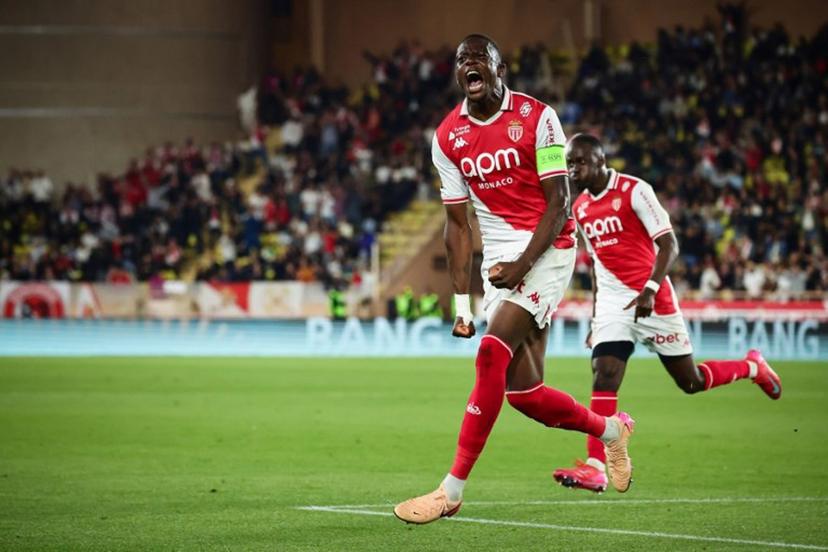 Monaco's Swiss midfielder #06 Denis Zakaria celebrates after scoring his team's second goal during the French L1 football match between AS Monaco and Olympique Lyonnais (OL) at the Louis II Stadium (Stade Louis II) in the Principality of Monaco on May 10, 2025.  CLEMENT MAHOUDEAU / AFP