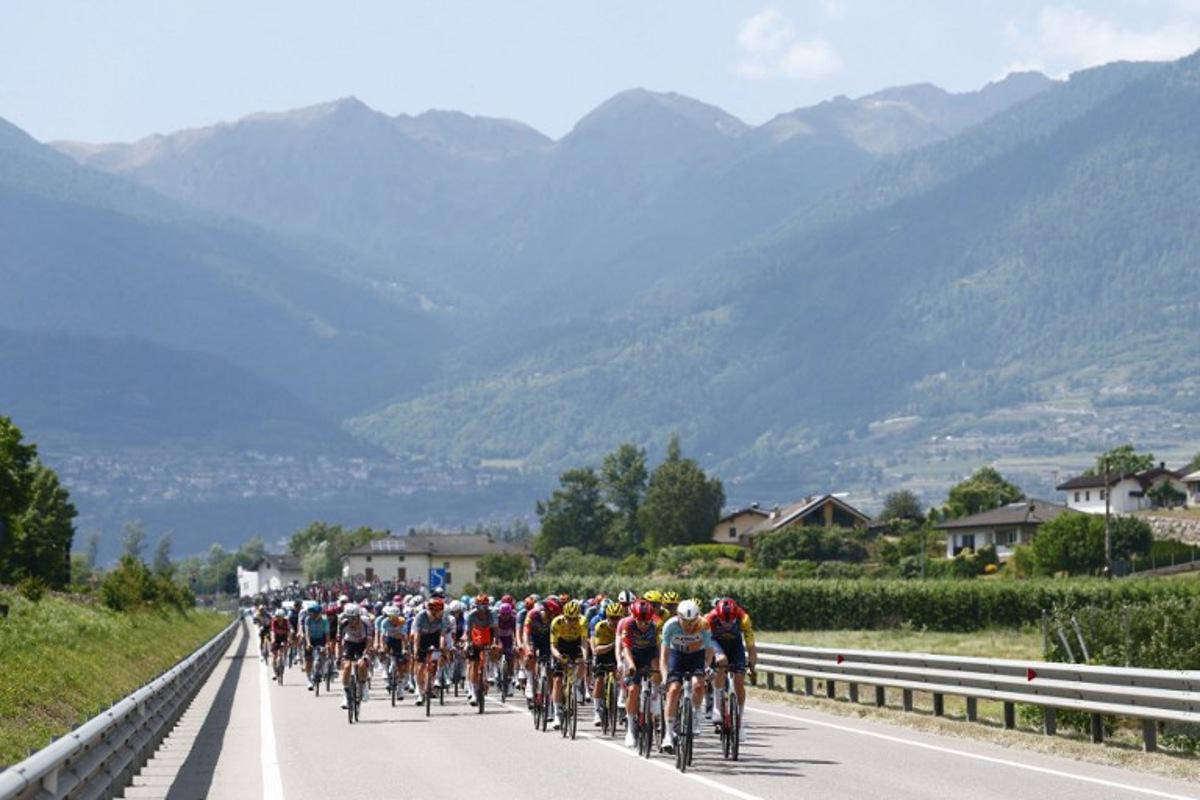 The pack rides during the 18th stage of the Giro d'Italia 2026 - Tour of Italy cycling race between Fai della Paganella and Pieve di Soligo, Italy, on May 28, 2026.  Luca Bettini / AFP