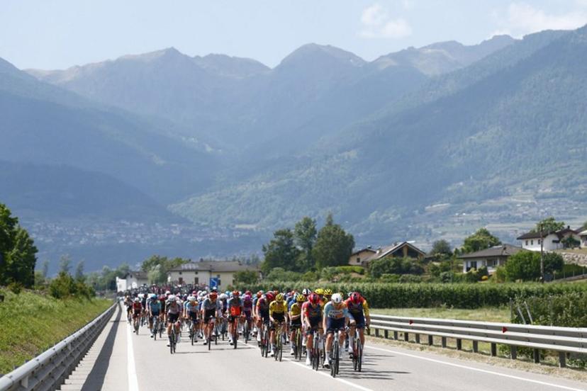 The pack rides during the 18th stage of the Giro d'Italia 2026 - Tour of Italy cycling race between Fai della Paganella and Pieve di Soligo, Italy, on May 28, 2026.  Luca Bettini / AFP