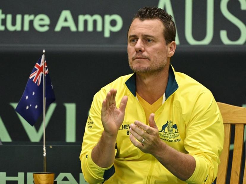 Australia's national team captain and former tennis player Lleyton Hewitt claps his hands during the single match between Sweden's Leo Borg (unseen)and Australia's John Peers (unseen) in the Davis Cup match between Sweden and Australia at the Royal Tennis Hall in Stockholm, Sweden, on February 1 2025.  Jonas EKSTROMER / TT NEWS AGENCY / AFP