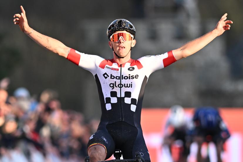 Belgian Thibau Nys celebrates as he crosses the finish line to win the men's race at the Cyclocross World Cup cyclocross event in Flamanville, France, Sunday 30 November 2025, the 2nd stage (out of 12) in the World Cup of the 2025-2026 season. BELGA PHOTO DAVID PINTENS